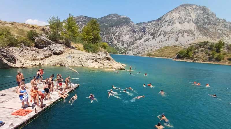 swimming on green canyon from side